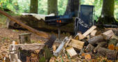 Chop some wood to keep cosy by the wood burner at Fairfield, Acorn Farm