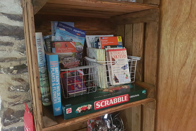 Guidebooks, games and local maps to borrow inside of The Linhay