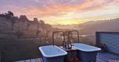 Take a soak in the double bath tubs and watch the sunset at The Old Piggery in Devon