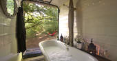 A bubble bath with a view at Sapperton Yurt in Gloucestershire