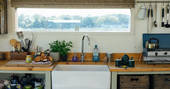 The fully equipped kitchen to cook up a holiday feast in at the Woodcock Cabin, Bagthorpe Farm in Norfolk