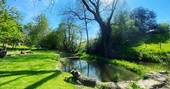 Caban Eric shepherds hut pond, Llygad Yr Haul, Mold, Flintshire