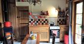 The Woodman's Cabin kitchen at Covert Cabin in Dordogne, France