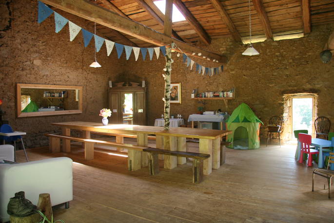 Barn dining area at Auvergne Naturelle, Haute-Loire