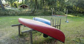 Canoes for guests to use and hire out at Bot-Conan Lodge in France