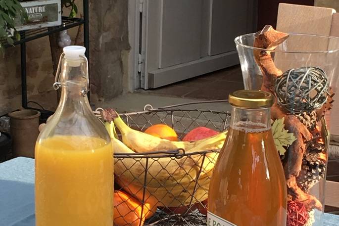 Fresh fruit and juice on the table at Le Mas Normand